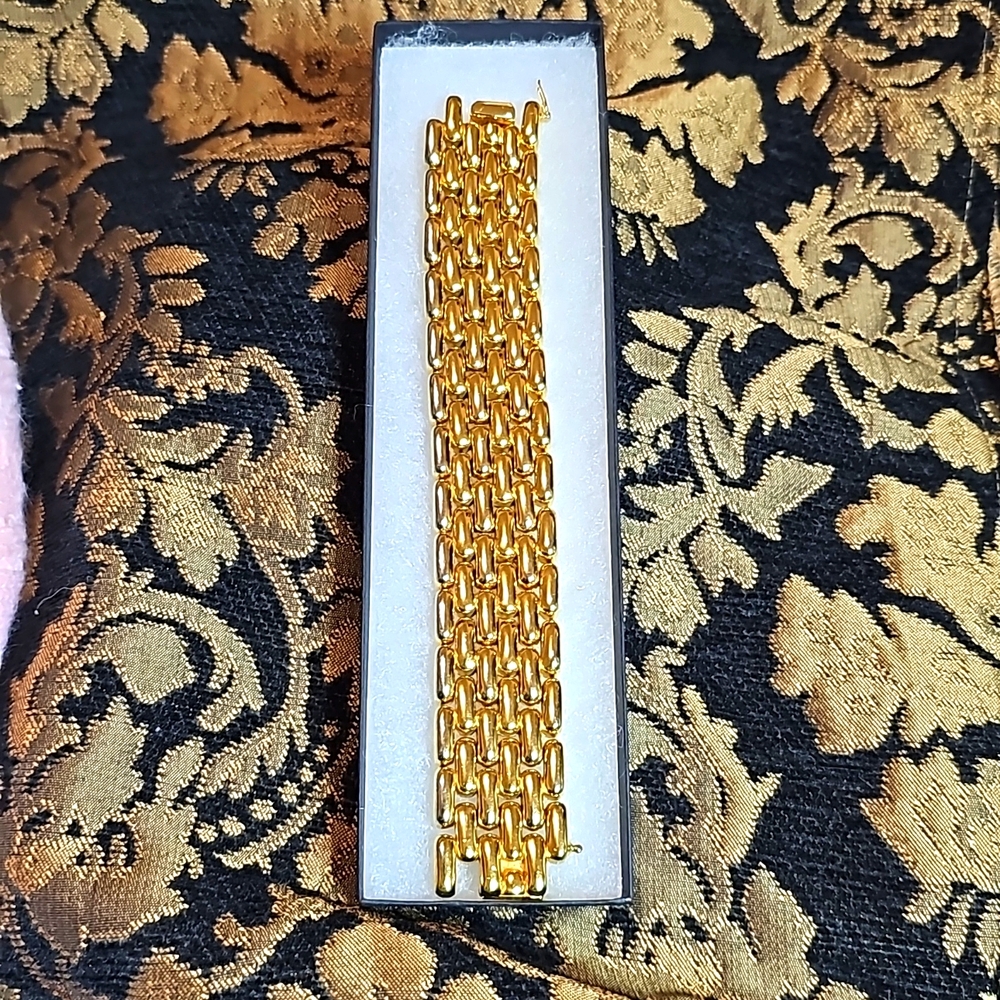 Ciner Gold Tone Wide Panther Link Bracelet